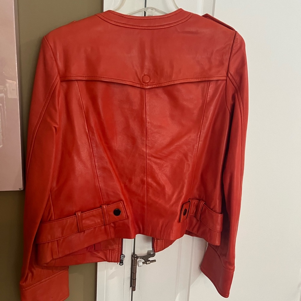 Genuine leather jacket, size large by velvet heart.